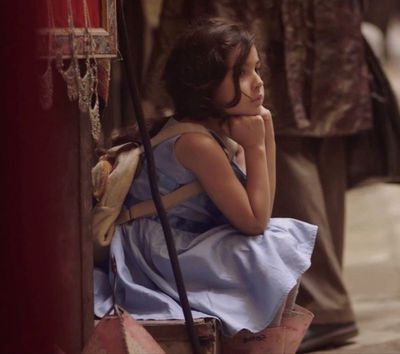 Girl on a stoop